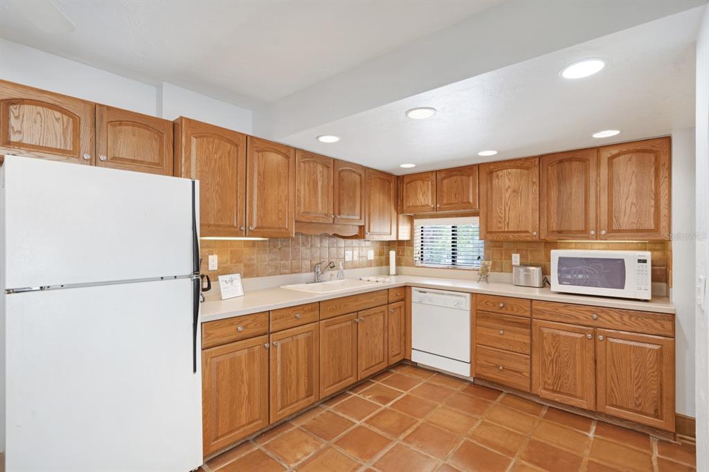 6157 MIDNIGHT PASS ROAD UNIT E