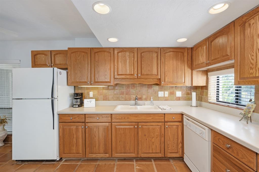 6157 MIDNIGHT PASS ROAD UNIT E