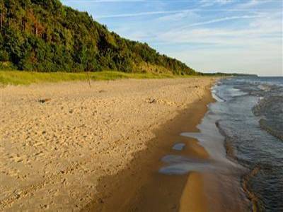 This is one Terrific Lot with over 1 Acre of wooded beauty and LAKE MICHIGAN VIEWS